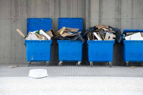 Waste collection trucks operating in Neasden
