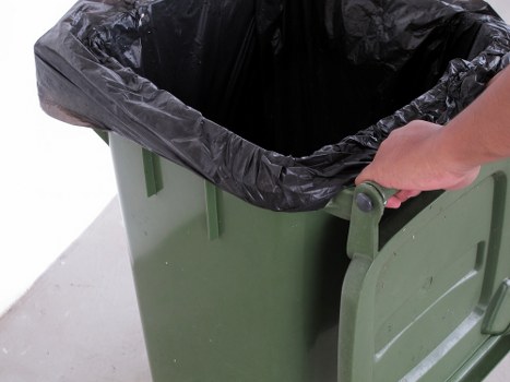 Professional waste clearance team managing construction debris